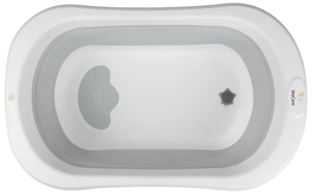 Vit plastbadbalja för bebis med ergonomisk form, halkfri yta och avtappningspropp. Utrustad med konturerat nackstöd och släta kanter för säkerhet och komfort.