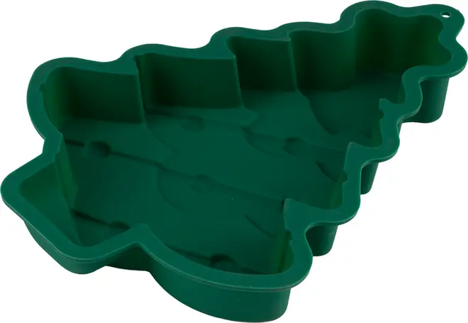 Grøn silikone bageform formet som et juletræ. Fleksibel, non-stick overflade, egnet til kager eller desserter. Har detaljeret træomrids og høje kanter.