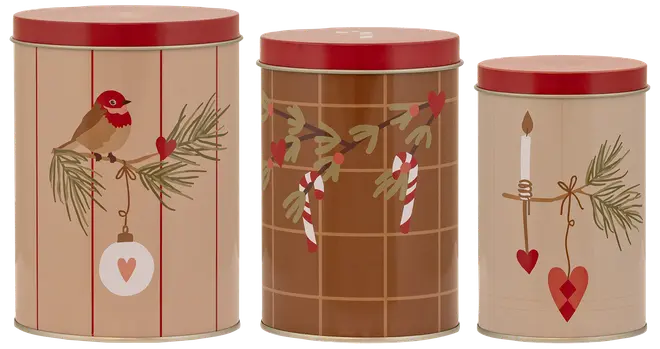 Sæt med tre runde metaldåser med røde låg, hver dekoreret med julemotiver: fugl med julekugle, slikstokke med gran og lys med hjerte. Perfekt til opbevaring.
