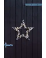 Hängande stjärnformad dekoration med metallram och varmvita LED-ljusslingor, passar för inomhus- eller utomhusbruk som fest- eller julbelysning.
