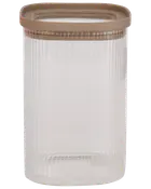 Klar rillet glasopbevaringskrukke med rund form og beige lufttæt plastiklåg. Perfekt til opbevaring af tørvarer i køkkenet, holder indholdet frisk og synligt.