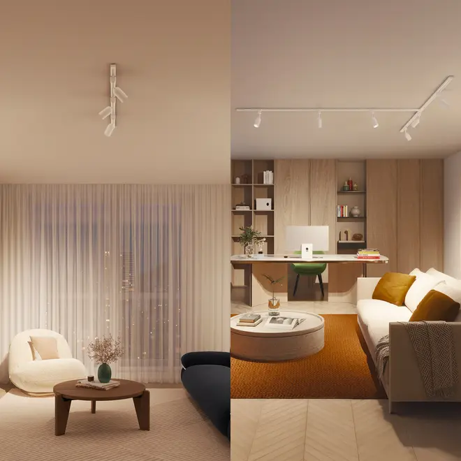 Moderne stue og kontor med hvide justerbare loftsskinne-spotlights, neutrale møbler, rundt sofabord, hyggelige siddepladser og vægge med træpaneler. Perfekt til stilfuld belysning.