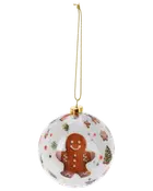 Rund julgranskula med pepparkaksgubbe, festliga motiv och gyllene snöre. Vit bakgrund med färgglada julmotiv som granar, snöflingor och godis. Blank yta.