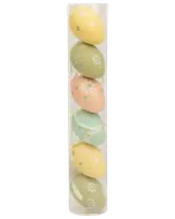 Sæt med seks dekorative æg i pastelfarver i et klart rør, med blomster- og prikkemønstre. Perfekt til påske- eller forårsdekoration. Lavet af let materiale.