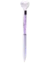 A pen with a decorative clear heart-shaped topper, a transparent barrel filled with small purple crystals, and a sleek light purple lower body. The pen has a metallic accent separating the crystal-filled section from the writing tip.