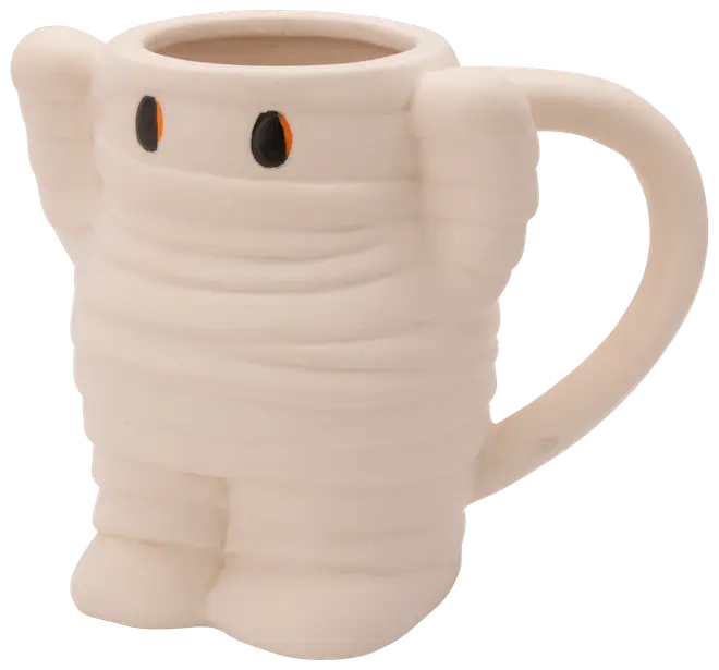 Keramikkopp formad som en söt mumie med upphöjda armar, svarta och orange ögon samt stort handtag. Matt vit yta med bandagedetaljer. För varma eller kalla drycker.