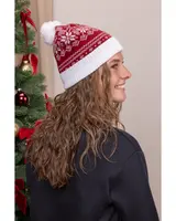 Röd och vit stickad vintermössa med snöflingemönster och vit tofs, bred vit ribbad kant. Varm och festlig, perfekt för kalla dagar och jul.