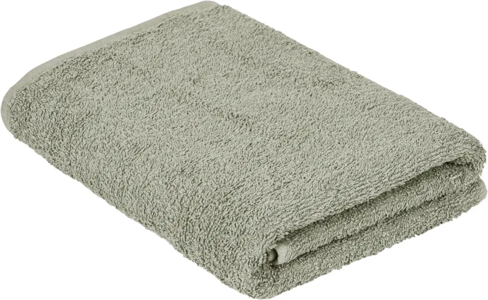 Ljusgrön badhandduk, prydligt vikt. Tillverkad av mjuk, absorberande bomullsfrotté med diskret kant. Standardstorlek, enkel design, maskintvättbar, perfekt för dagligt bruk.