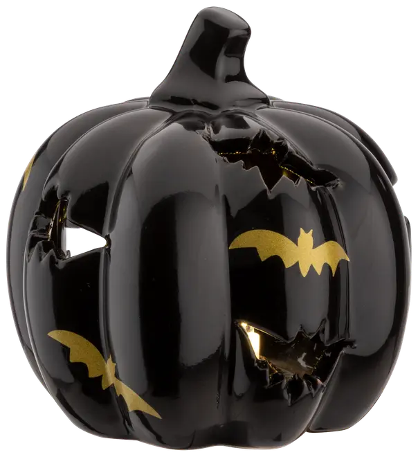 Blank svart keramisk pumpa med utskurna fladdermöss och guldfärgade fladdermusdetaljer. Dekorativ Halloweenprodukt, ihålig, passar för värmeljus.