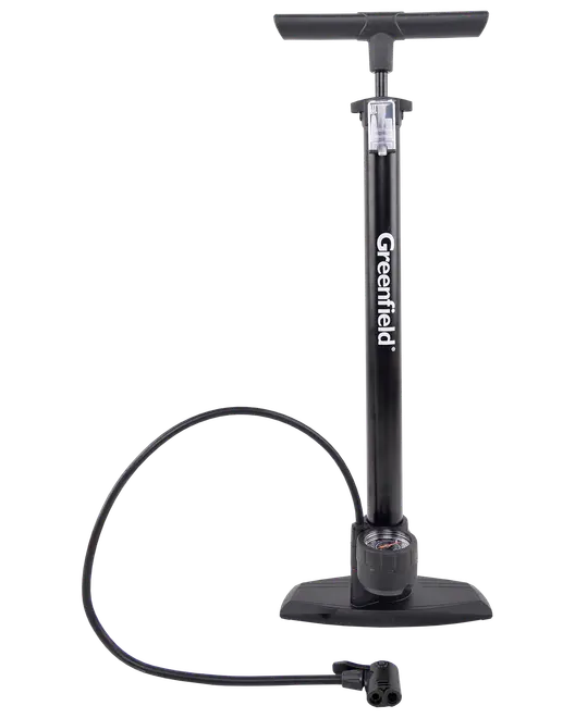 Tall, black manual pump with a wide T-shaped handle, sturdy base for stability, and a long flexible hose. Features a built-in pressure gauge near the base for accurate inflation and a dual-valve head compatible with different types of tire valves. The brand name 'Greenfield' is printed vertically on the main tube.