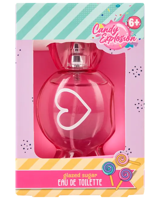 Lyserød hjerteformet parfume med teksten 'Candy Explosion Glazed Sugar Eau de Toilette', egnet til børn fra 6 år, pakket i farverig æske med sliktema og slikkepinde.