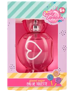 Lyserød hjerteformet parfume med teksten 'Candy Explosion Glazed Sugar Eau de Toilette', egnet til børn fra 6 år, pakket i farverig æske med sliktema og slikkepinde.