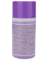 Lille cylindrisk beholder med lilla låg, detaljeret produktinformation og instruktioner trykt på bagsideetiketten på flere sprog. Velegnet til opbevaring af væsker eller cremer.