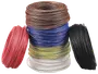Sæt med seks ruller elektrisk ledning i rød, brun, blå, gul-grøn, hvid og sort. Hver rulle er isoleret kobberledning.