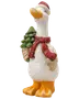 Hvid andefigur med nissehue og rød tørklæde, bærende et juletræ og en sæk, med orange næb og fødder.