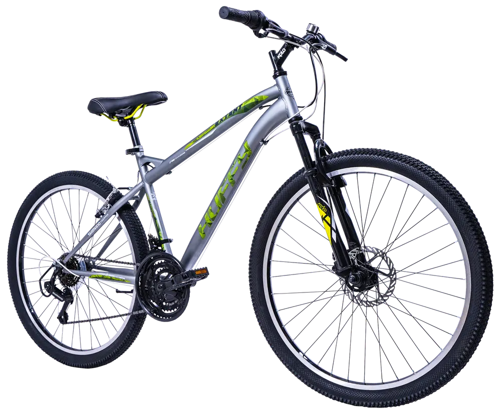 Silverfärgad mountainbike med framdämpning, 21-växlad växelsystem, skivbromsar, svarta styren och grova däck. Bekväm sadel och hållbar ram för terräng och stad.