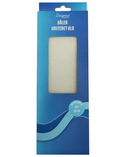 Sula av imiterad ull, storlek 38-46, för komfort och värme. Förpackad i blå ask med fönster som visar produkten.