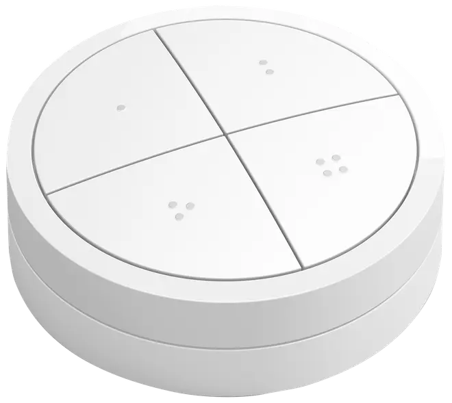 Rund hvid smartkontakt med fire store knapper, hver markeret med tre små hævede prikker i forskellige mønstre. Minimalistisk design til smart home-styring.