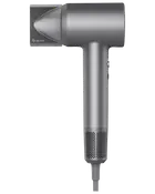 Elegant, grå hårtørrer med moderne, kompakt design, cylindrisk håndtag og aftagelig dyse for præcis luftstrøm. Har netindtag i bunden og strømledning.