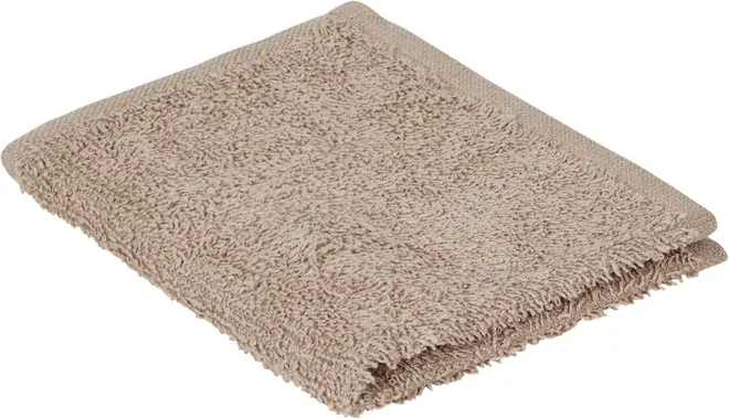 Sammenfoldet beige vaskeklud i blød, absorberende frotté bomuld. Har en tekstureret overflade og færdige kanter, velegnet til skånsom rengøring og daglig brug.