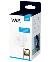 WiZ bevægelsessensor i hvid, kompatibel med alle WiZ-produkter, registrerer bevægelse op til 3 meter, batteridrevet, understøtter app-integration til smart home-automatisering.