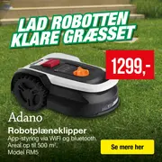 Gennemsigtig opbevaringskasse med farverige puder i.