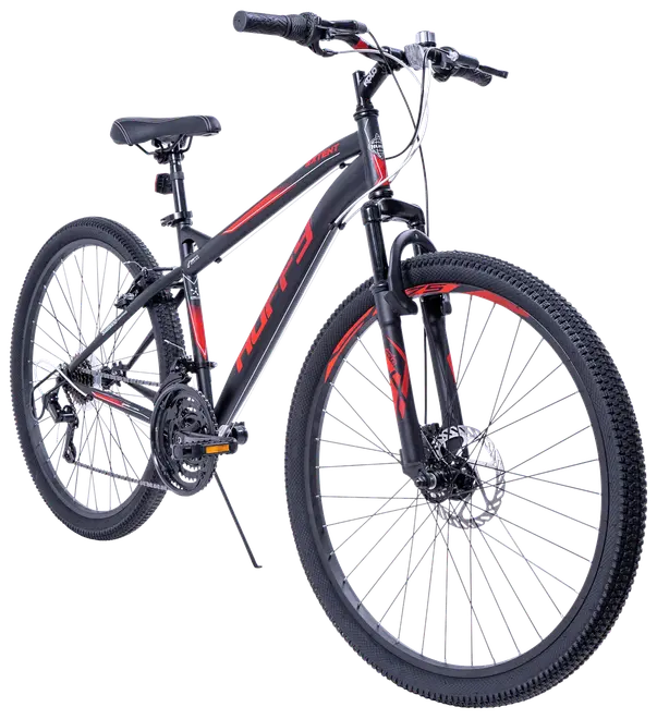 Sort og rød mountainbike med frontaffjedring, skivebremser, grove dæk, justerbart sæde og flere gear. Ideel til terrænkørsel og robusthed på ujævnt underlag.