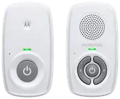 Motorola babyvaktset, två vita enheter med strömknappar, LED-indikatorer, högtalargaller och kontrollknappar för volym och parkoppling. Kompakt och lättanvänt design.