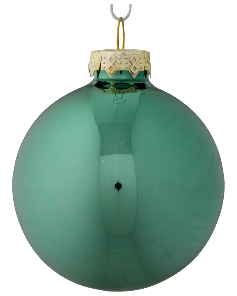 Rund, blank julgranskula i teal med dekorativt guldfäste och upphängningsögla. Slät glasyta, perfekt för granen eller dekoration. Enkel, elegant design för högtiden.