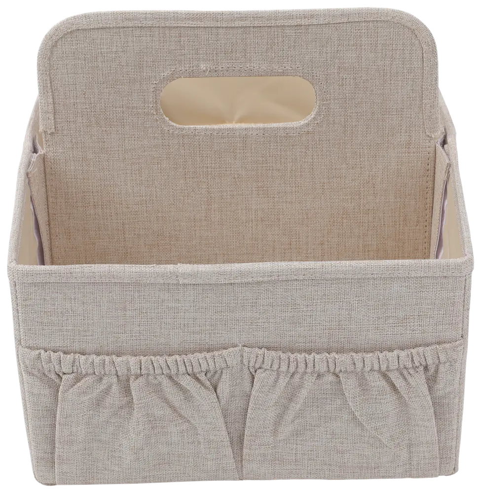 Rektangulær opbevaringskurv i beige stof med håndtag og elastiske lommer foran. Perfekt til organisering af husholdningsartikler. Robust og passer til forskellige boligindretninger.