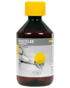 Brun plastflaske med gult skruelåg, mærket "Knastelak Vandbaseret." Anvendes til vandbaseret forsegling af knaster i træ. Etiketten viser en pensel på træ.