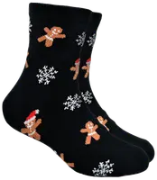 Svarta strumpor med pepparkaksgubbar, några med tomteluva, och vita snöflingor. Festlig design för julen. Mellanhöga, mjukt stickat material för komfort.