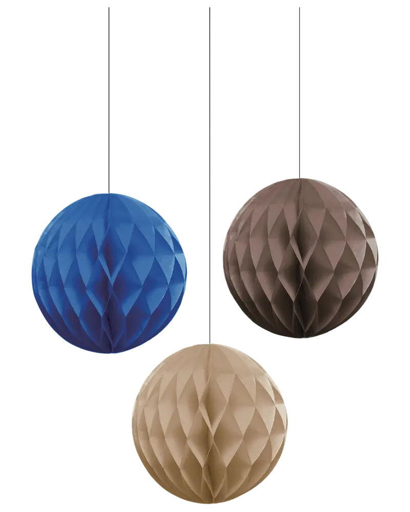 Three spherical hanging decorations made of folded paper with a honeycomb texture. Each sphere has a different color: one is blue, one is brown, and one is beige. The decorations are suspended from thin black strings and have a geometric, faceted appearance due to the way the paper is folded.