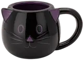 Svart keramikmugg formad som ett kattansikte med lila insida, öron, nos och morrhår. Stor hank, rund kropp och lekfull design. För varma eller kalla drycker.