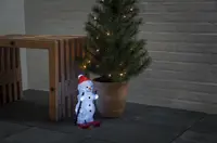 Snöman på skidor 30 cm