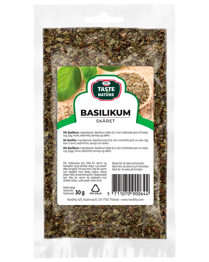 30g återförslutningsbar plastpåse med torkad, skuren basilika från Taste of Nature. Transparent framsida visar innehållet. Etikett med produktnamn, ingredienser och förvaringsanvisningar.
