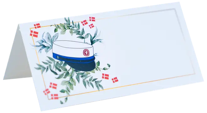 Foldet bordkort med studenterhue, grønne blade og små danske flag. Hvid baggrund med guldkant og tomt felt til navneskrivning.
