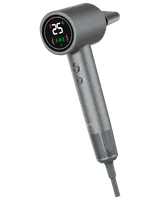 Elegant grå hårtørrer med digitalt display, der viser temperatur, to kontrolknapper, ergonomisk håndtag og aftagelig dyse. Moderne design til professionel eller hjemmebrug.