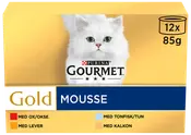 Purina Gourmet Gold Mousse kattmat, 12 burkar à 85g. Blandade smaker: oxkött, lever, tonfisk, kalkon. Förpackningen har en vit katt på guldbakgrund.