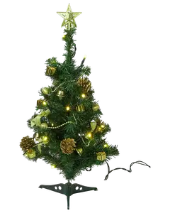 Liten konstgjord julgran med guldfärgade dekorationer, kottar, gula LED-lampor och guldfärgad stjärna. Levereras med svart fot, passar bord eller små utrymmen.