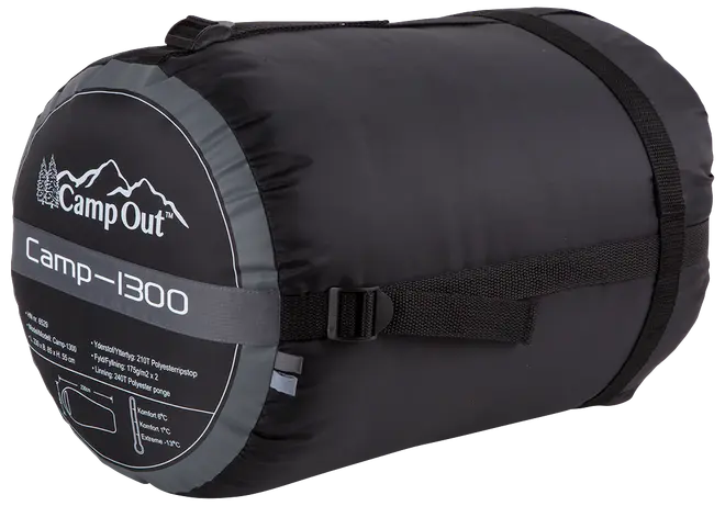 Sort CampOut Camp-1300 sovepose i kompakt, cylindrisk bæretaske med kompressionsstropper, logo og produktinformation trykt på enden. Velegnet til camping og udendørs brug.