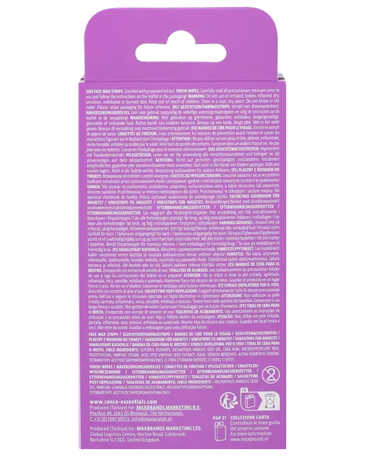Bagsiden af en lilla æske med ansigtsvoksstrips. Indeholder detaljerede instruktioner, ingredienser og advarsler på flere sprog. Nederst ses hjemmeside, genbrugssymboler og producentoplysninger.