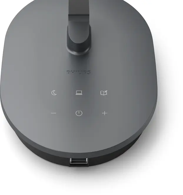 Moderne sort skrivebordslampefod med touch-knapper til lysstyrke, tænd/sluk og lysindstillinger. Har USB-opladningsport foran. Elegant, minimalistisk design fra Philips.
